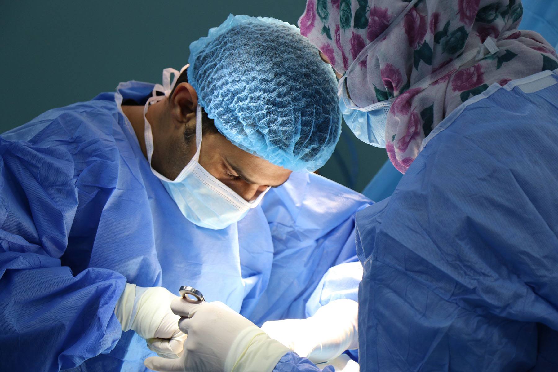 Focused medical team providing specialized surgical care.